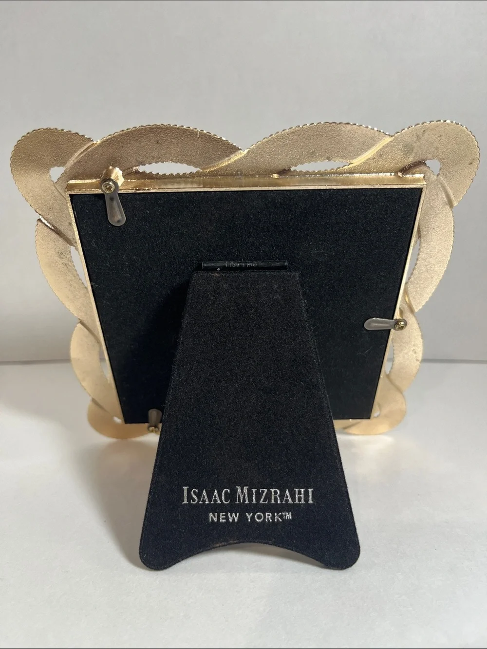 Isaac Mizrahi stands dresser